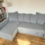 Grey IKEA HOLMSUND corner sofa-bed