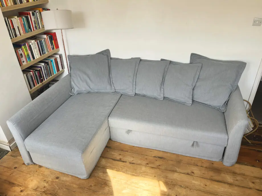 Grey IKEA HOLMSUND corner sofa-bed
