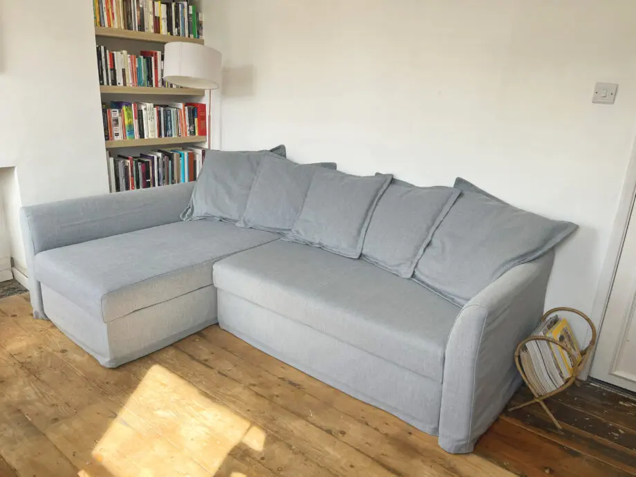 Grey IKEA HOLMSUND corner sofa-bed