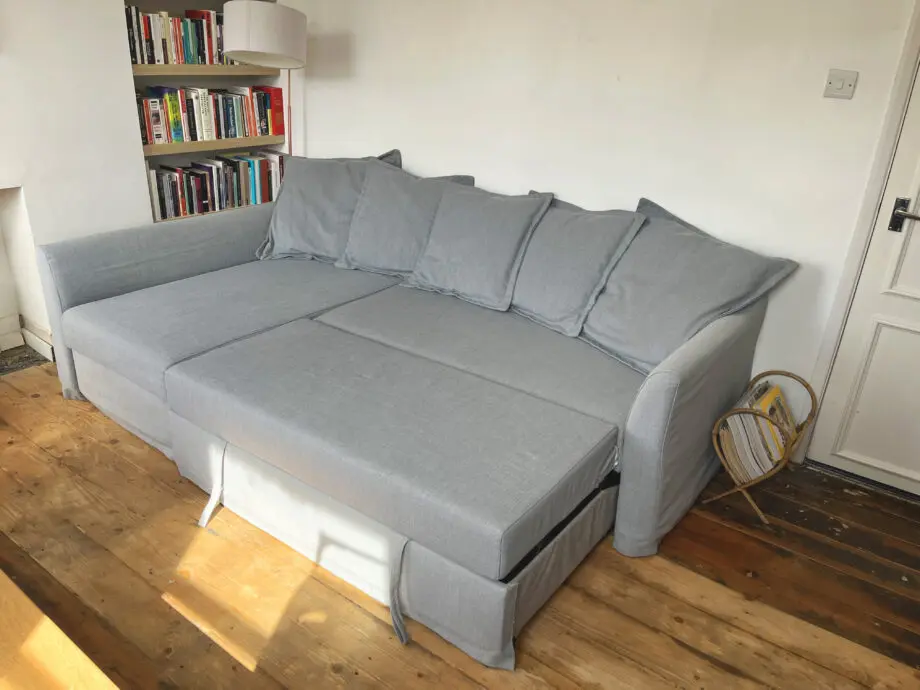 Grey IKEA HOLMSUND corner sofa-bed