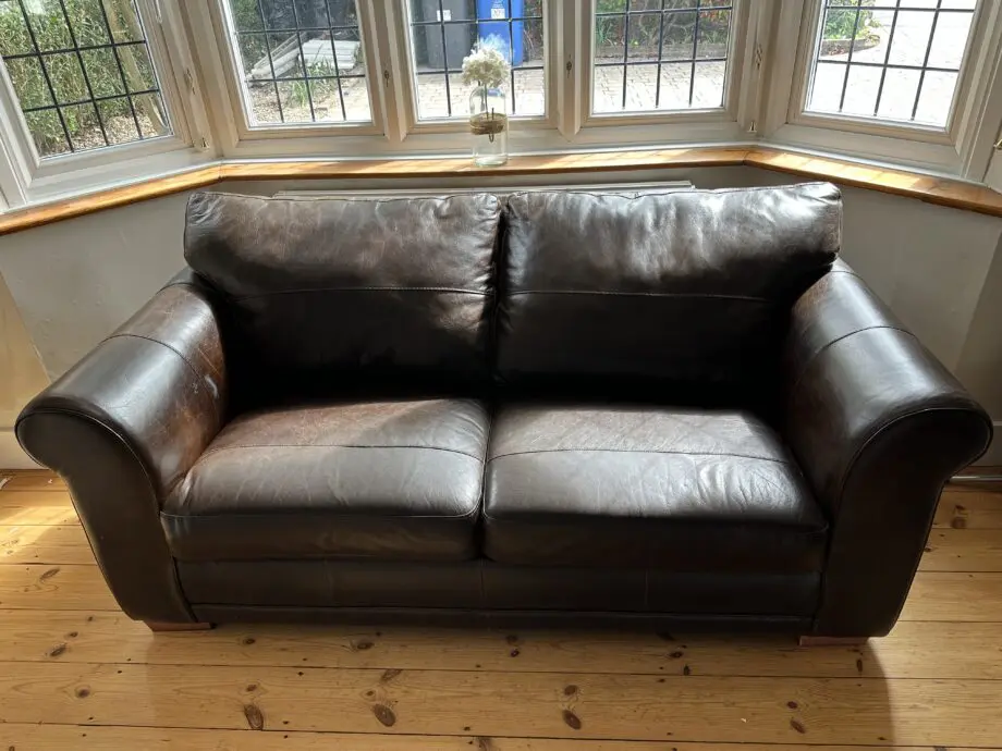 Next Dark Brown Leather 2 seater Sofa with dark wooden block feet