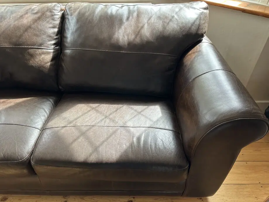 Next Dark Brown Leather 2 seater Sofa with dark wooden block feet