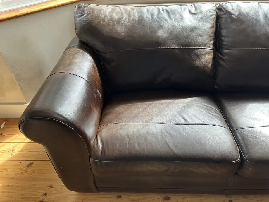Next Dark Brown Leather 2 seater Sofa with dark wooden block feet