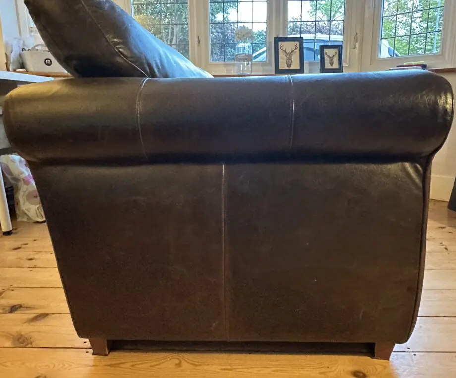 Next Dark Brown Leather 2 seater Sofa with dark wooden block feet