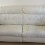 DFS 2 and 3 seater cream leather reclining sofas