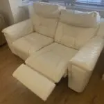 DFS 2 and 3 seater cream leather reclining sofas