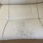 DFS 2 and 3 seater cream leather reclining sofas