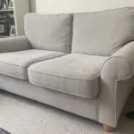 Laura Ashley 2 seater sofa in natural with light oak legs