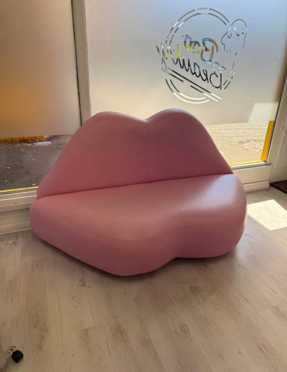 Lip shape pink leather sofa