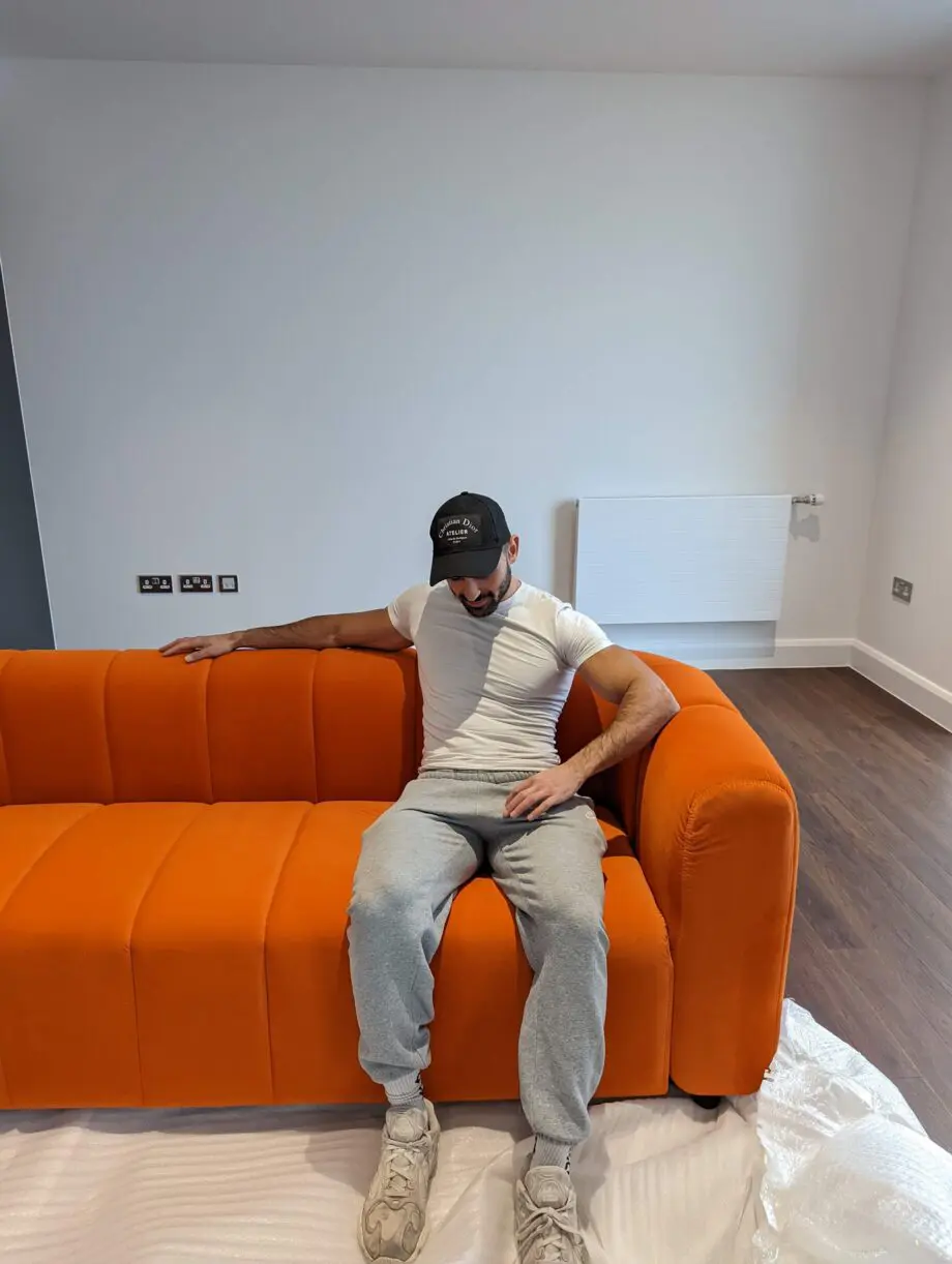 Modern and cool 3 seater sofa in orange, great condition