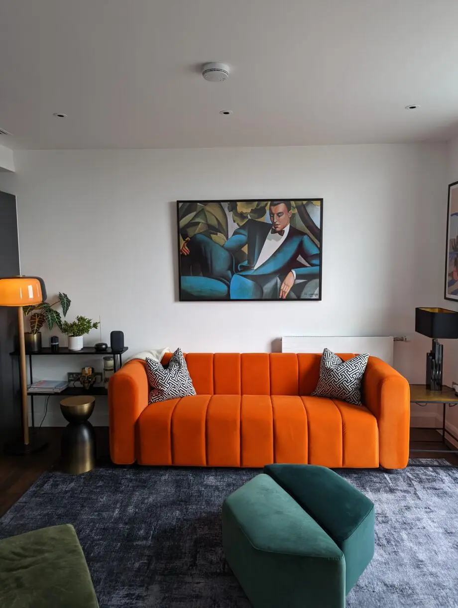 Modern and cool 3 seater sofa in orange, great condition