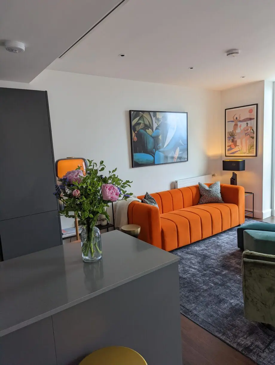 Modern and cool 3 seater sofa in orange, great condition