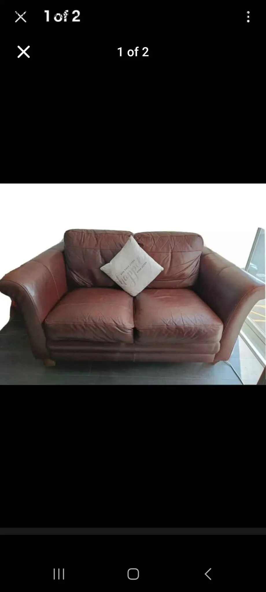 John Lewis brown genuine leather sofa.