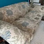 Sofa Workshop Beige Sofa with embroidered blue flowers.