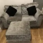 Grey 2 sofa seater with foot rest