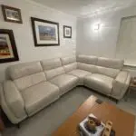Dfs cream leather corner sofa with electric foot raises