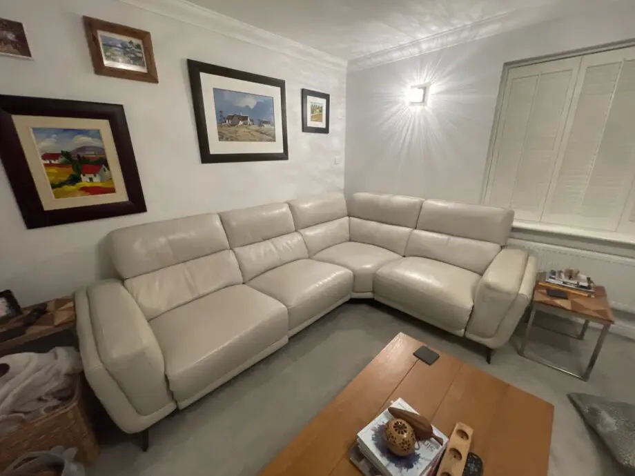 Dfs cream leather corner sofa with electric foot raises