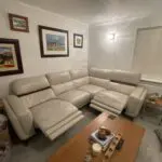 Dfs cream leather corner sofa with electric foot raises
