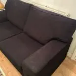 Black three seater sofa