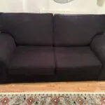 Black three seater sofa