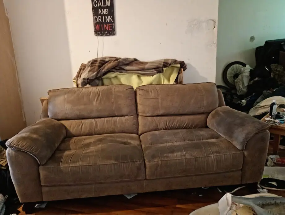 Three piece sofa and armchair