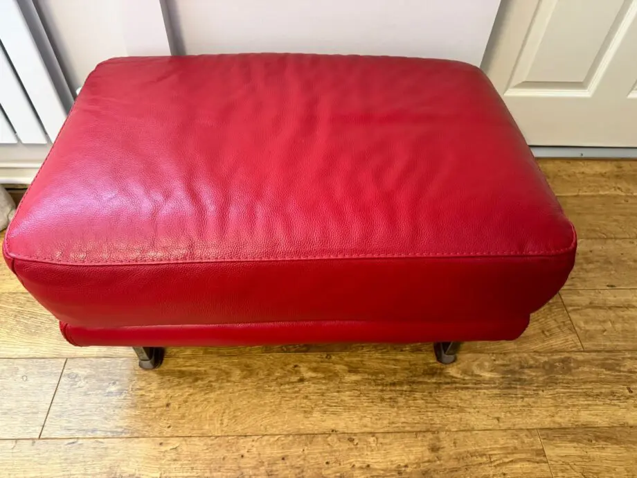 DFS red 2 x 2 seater Sofas with reclining headrests + footstool with silver feet