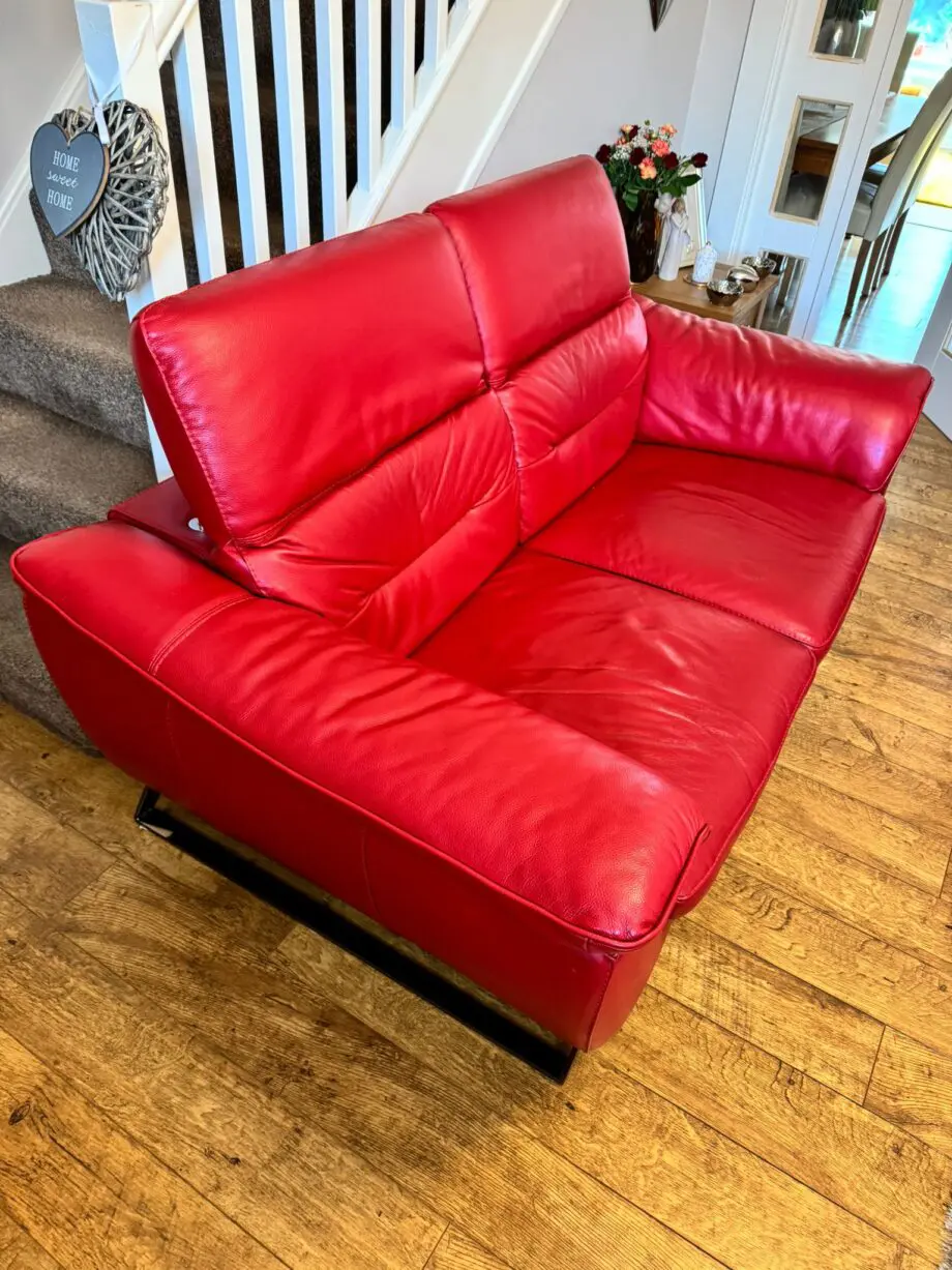 DFS red 2 x 2 seater Sofas with reclining headrests + footstool with silver feet