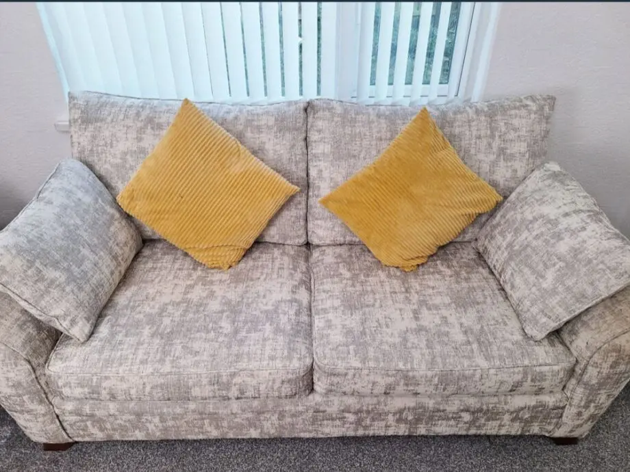 Grey colour comfortable 3 seater sofa.