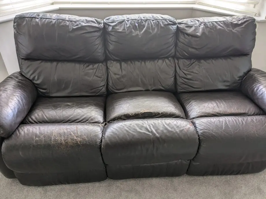 DFS 3 seater dark brown leather sofa