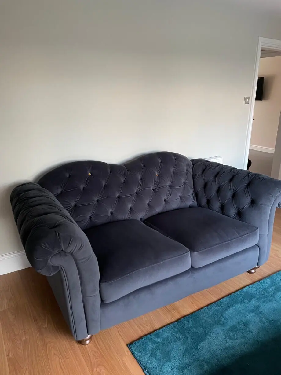 DFS Joules 2 seater velvet sofa.