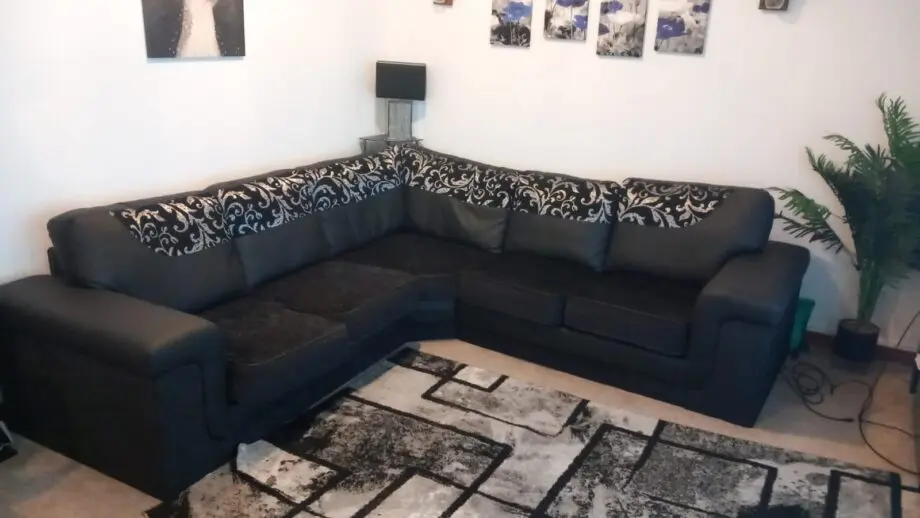 Black and silver corner sofa
