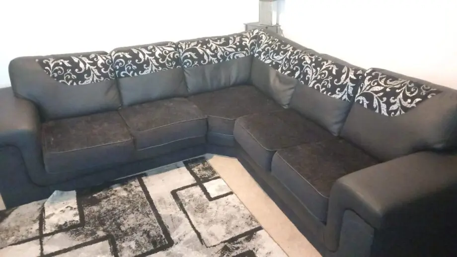 Black and silver corner sofa