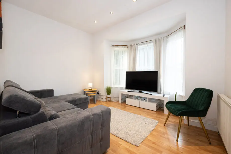 Grey L-shaped sofa bed