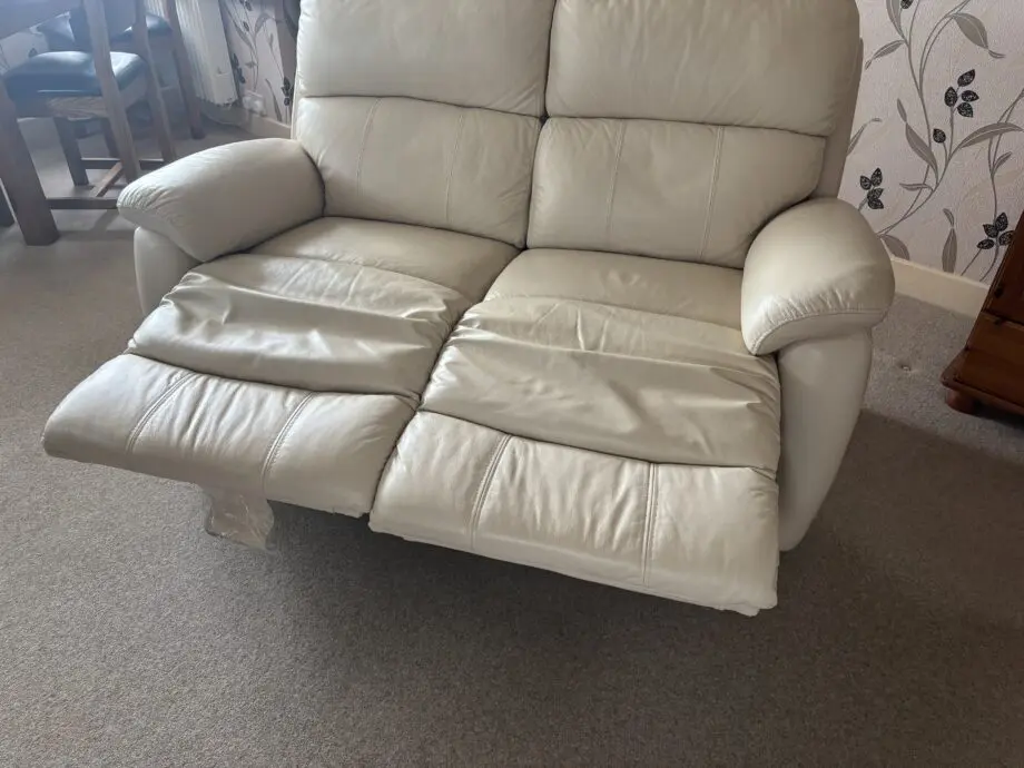 DFS 2 Seater Leather Manual Recliner Sofa in Cream