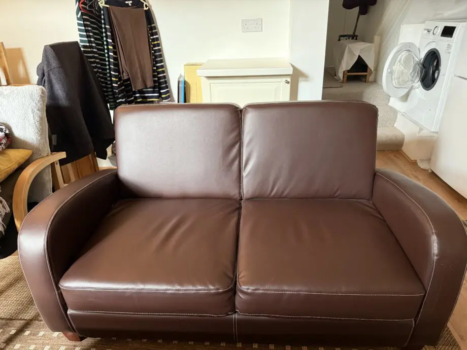 Faux brown leather sofa for sale