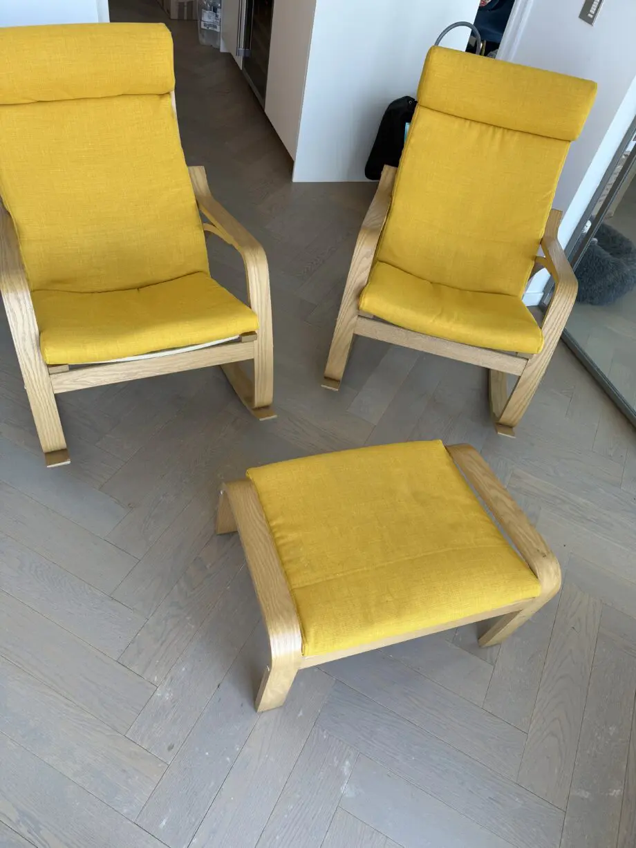IKEA yellow Poang rocking chair and foot stool