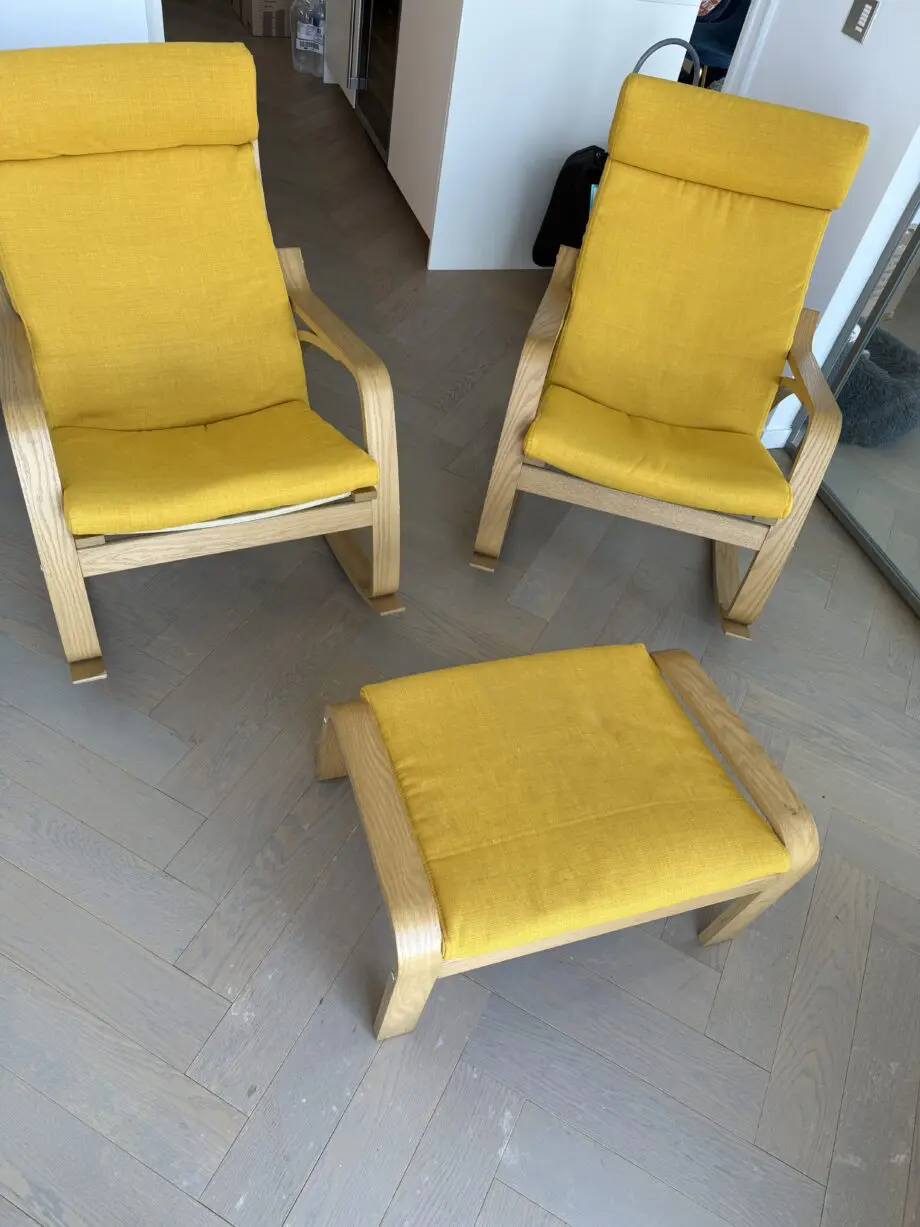 IKEA yellow Poang rocking chair and foot stool
