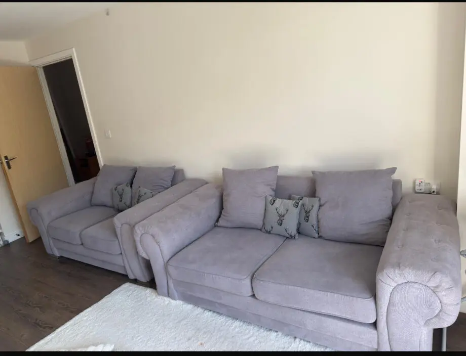 Grey 2 seater and 3 seater sofas.