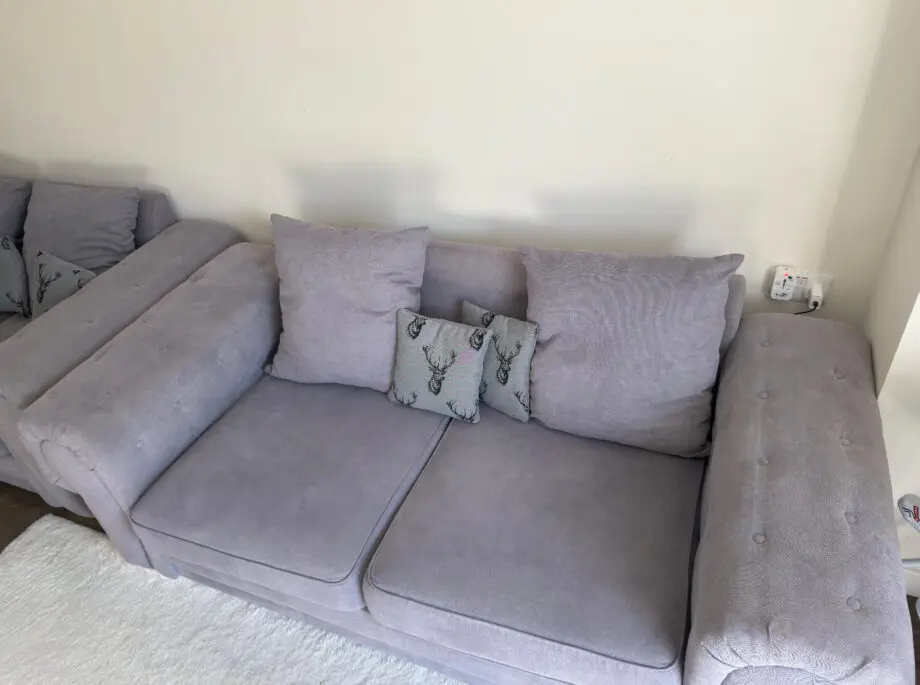 Grey 2 seater and 3 seater sofas.