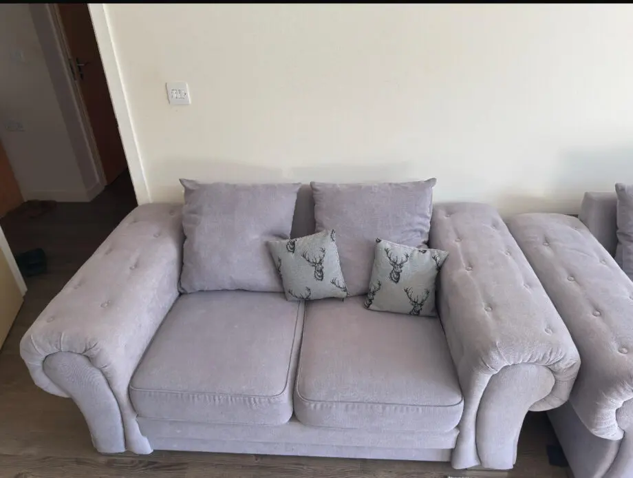 Grey 2 seater and 3 seater sofas.