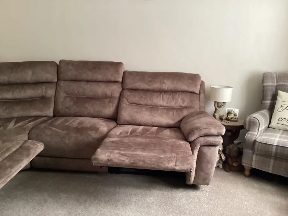 Corner sofa with recliners