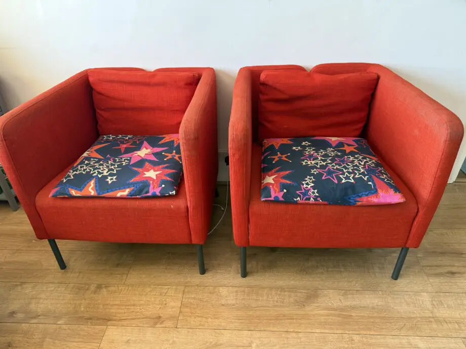 Red Ikea Sofa Chair with cushions