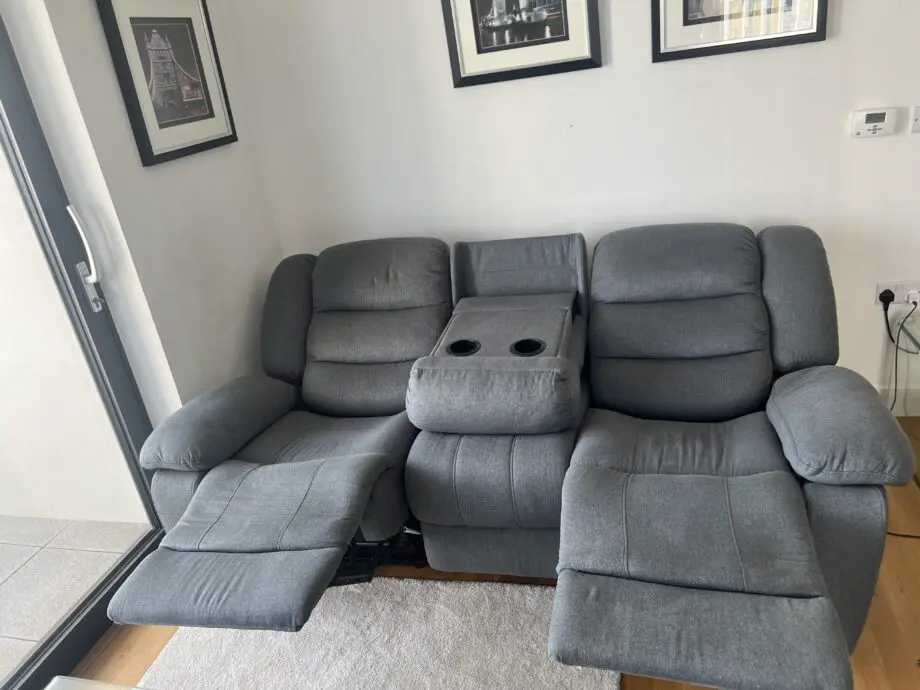 Grey 3 seater recliner sofa with cup holders