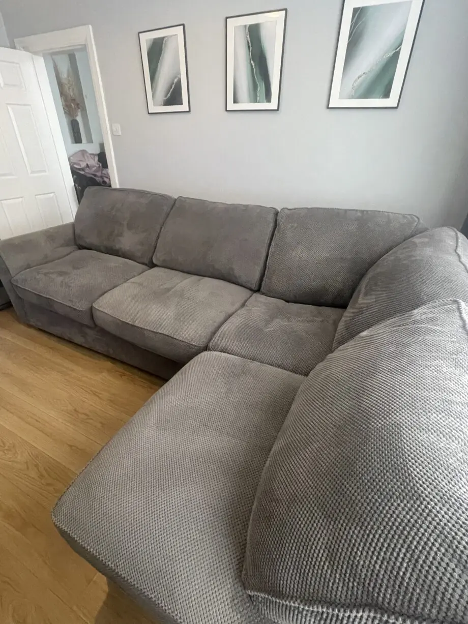 Grey corner left hand sofa with footstool