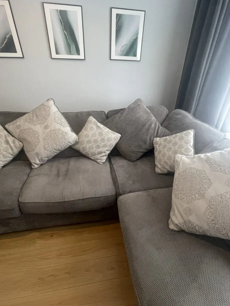 Grey corner left hand sofa with footstool