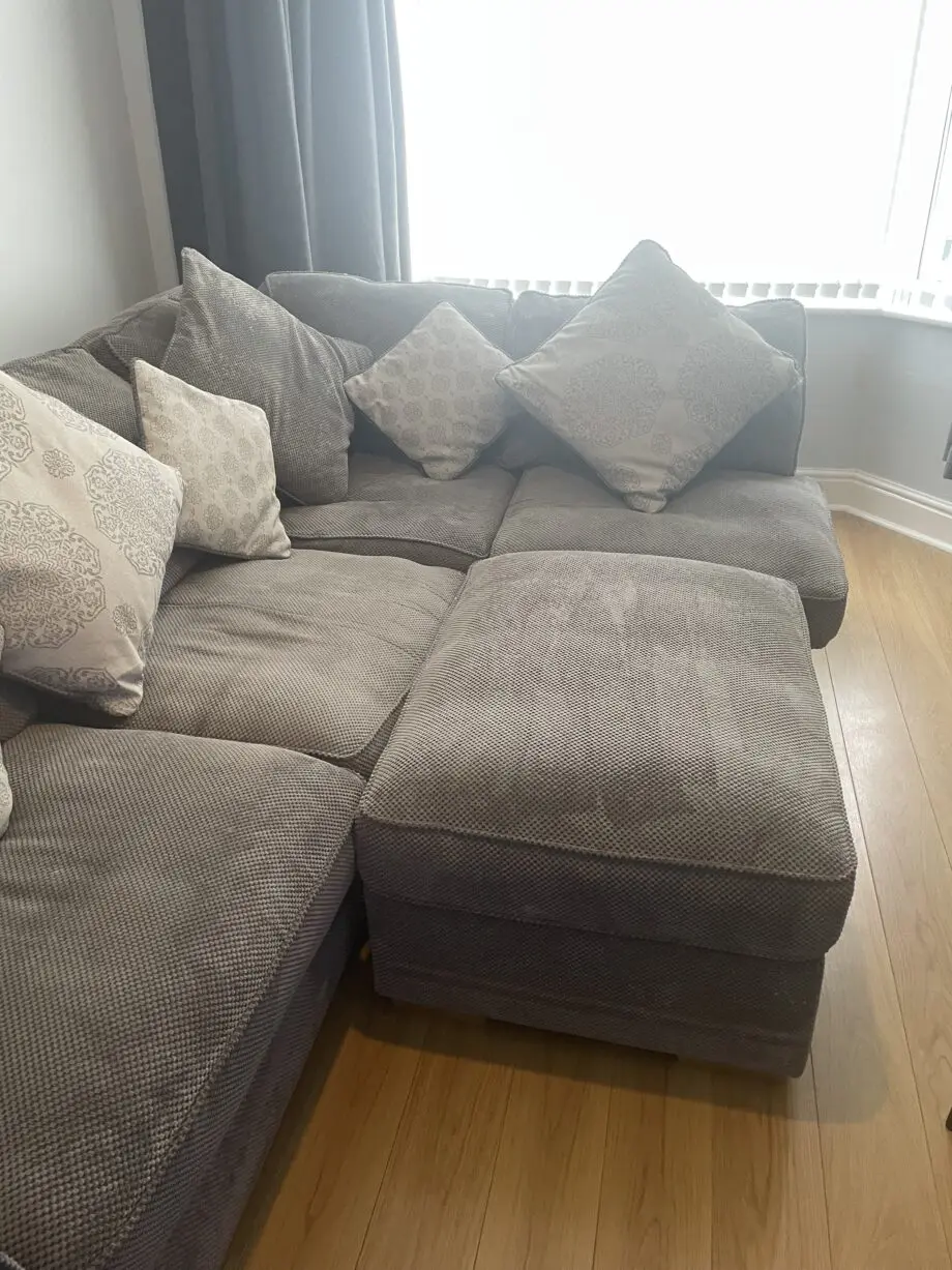 Grey corner left hand sofa with footstool