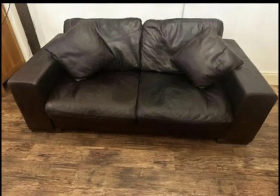 Natuzzi two 3 Seaters and square footstool Dark brown leather