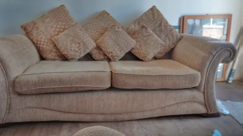 3 seater sofa & chair new been stored outside in log cabin and covered with sheets in immaculate condition