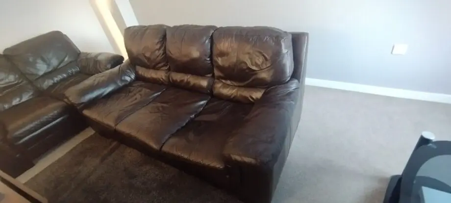 Brown leather DFS sofa