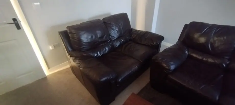 Brown leather DFS sofa